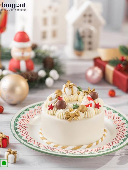 A classic festive treat, this spiced plum cake is filled with dried fruits and nuts. It's topped with smooth marzipan for a perfect finish, making it a dessert fit for Santa himself.