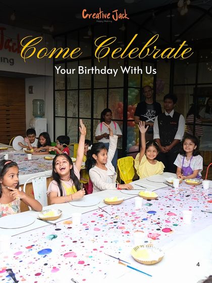 A room full of excited young artists ready to celebrate a birthday with paint and brushes. I love seeing kids so engaged and eager to start creating at my parties.