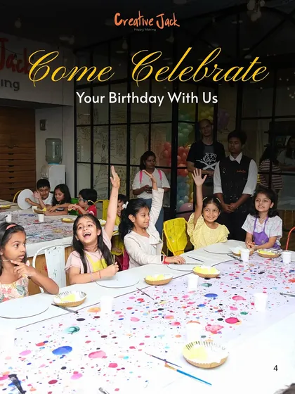A room full of excited young artists ready to celebrate a birthday with paint and brushes. I love seeing kids so engaged and eager to start creating at my parties.