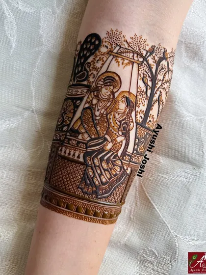The beauty is in the details. This close-up shows the fine line work and shading that goes into creating a divine Radha-Krishna portrait, surrounded by delicate trees and birds.