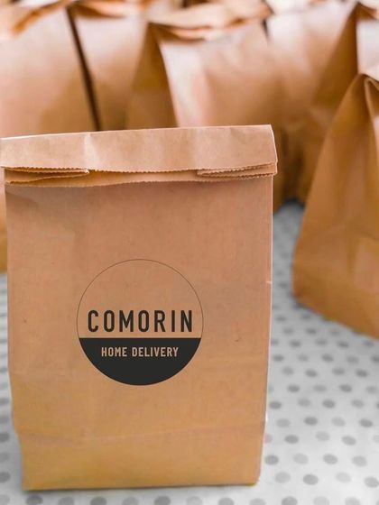 Simple, branded, and effective. Our home delivery bags are designed to carry your meal securely, promising that the Comorin experience is just a click away.
