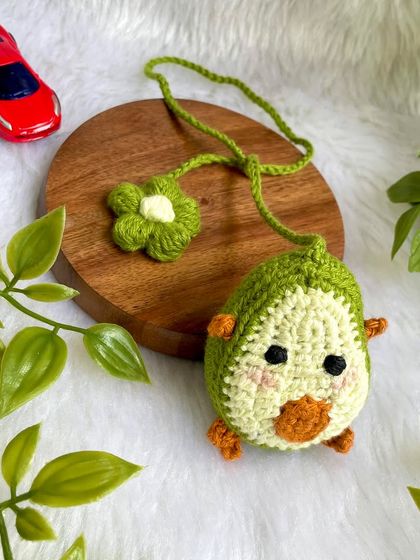 Another fun car accessory, this is a cute avocado car hanging. It comes with a little flower charm on the string.