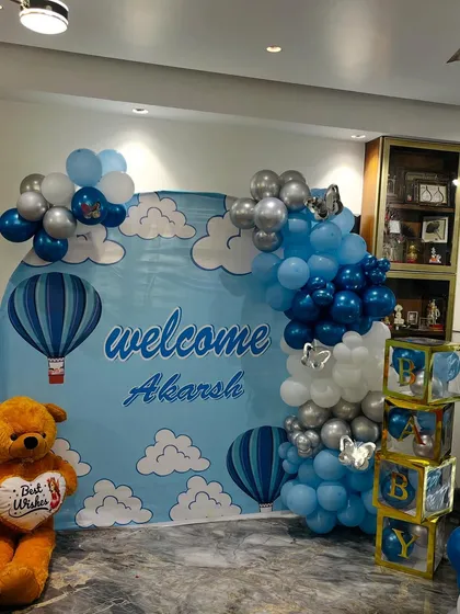 A clear view of the hot air balloon themed backdrop and decorations.