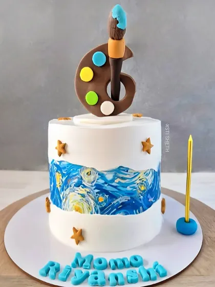 A creative art-themed cake for a 6th birthday, featuring an edible print of "Starry Night" and a handcrafted chocolate paint palette.