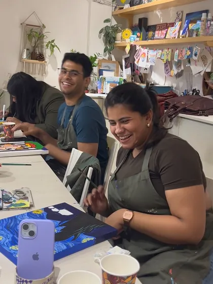 The joy of creating with others. This photo captures the laughter and camaraderie that is a signature part of the Alive Studio experience.