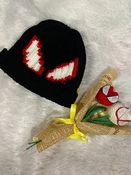 For all the Spiderman fans out there, I created this custom set. It features a handmade crochet beanie with the iconic eyes and a matching bouquet with Spiderman-themed tulips.
