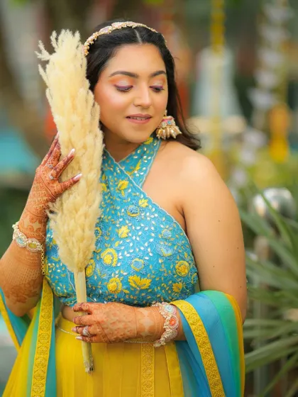 A Haldi ceremony is all about joy and vibrant colors. For this bride-to-be, I created a fresh, soft glam makeup look with sparkling eyes that was fun, waterproof, and perfect for the sunny celebration.