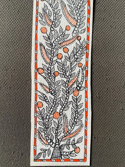 Another intricate Madhubani bookmark, this time with a 'Tree of Life' motif. The fine line work and delicate coloring showcase the student's growing skill.