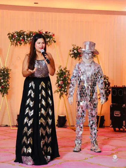 On stage with a mirror man, one of the unique entertainment elements at this wedding reception. I love collaborating with other artists to create a memorable show.