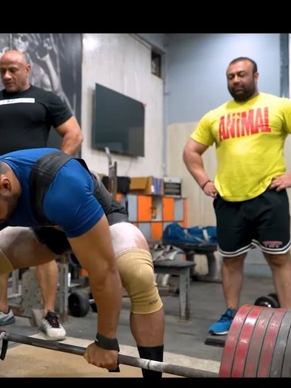 A candid shot with my Guruji, Mukesh Gahlot, watching over a young lifter. Passing on the knowledge.