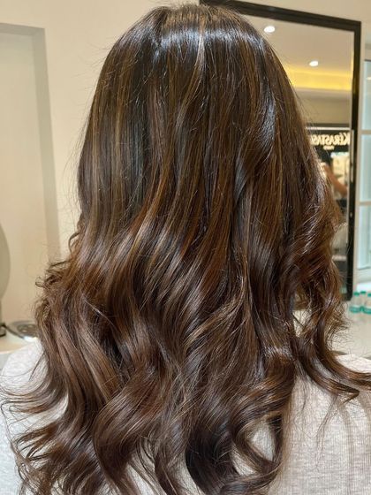 A closer look at the soft, blended waves of our Hazelnut Balayage. The tones are expertly woven to create a rich, natural finish.
