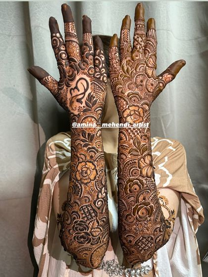 A full view of the design featuring the Om symbol and a heart with initials, blending spiritual and romantic elements.