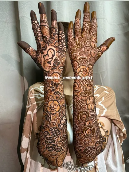 A full view of the design featuring the Om symbol and a heart with initials, blending spiritual and romantic elements.