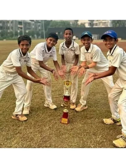 Our young champions posing with their trophies after a successful campaign in the Straight Drive U-12 Tournament.