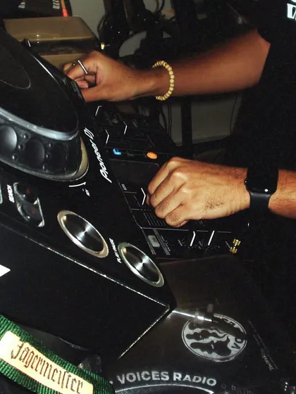 A close-up of my hands on the mixer during 'The Juice' radio show. This set was an open-format feel, blending hip-hop, house, and afro fusions.