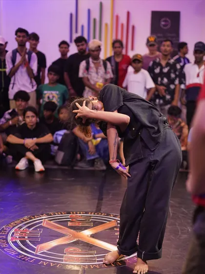A b-girl expresses herself through movement on the dance floor. We encourage individuality and self-expression in all our battle categories.