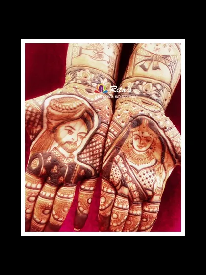 A close-up of the portraits from the 25th-anniversary mehendi, showing the couple on their wedding day. It's a beautiful way to reminisce and celebrate lasting love.