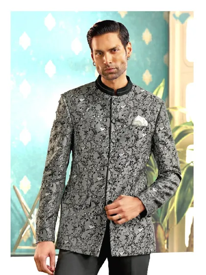 Modernity meets majesty in this textured grey bandhgala. We designed this piece with sharp, clean lines and a tailored fit, perfect for a sophisticated reception or sangeet look that commands attention with quiet confidence.