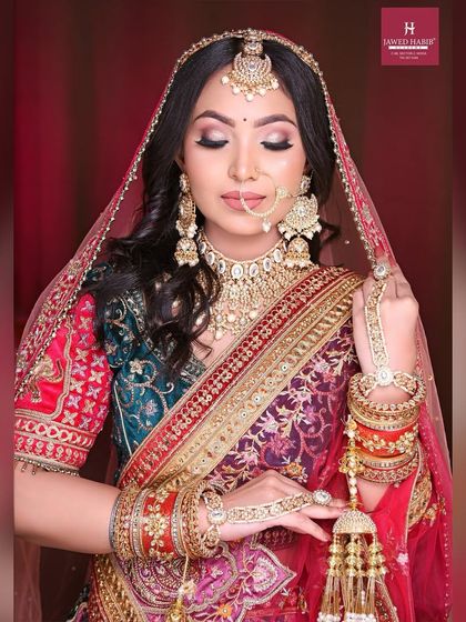 A stunning bridal portrait demonstrating techniques for working on acne-prone skin to achieve a flawless, camera-ready finish.