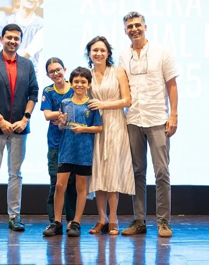 An award winner from our U11 Xcelerate team, supported by his family.