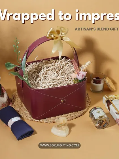 Wrapped to impress, the 'Artisan's Blend Gift Box' is a feast for the senses. It features green tea, a scented candle, and other artisanal products in a beautiful leatherette basket.