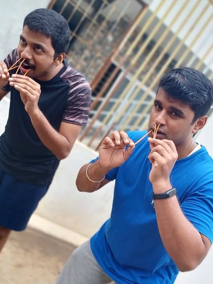 Two students practice Sutra Neti together. Learning these techniques in a supportive group environment helps build confidence.