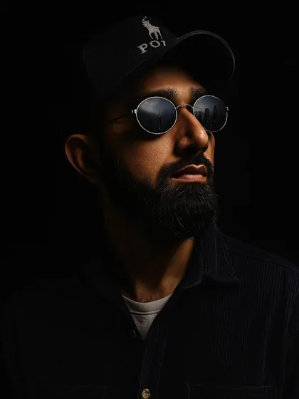 A professional portrait that captures my focus and passion for music. Changing your mindset is a game changer, and I bring that focus to every gig.