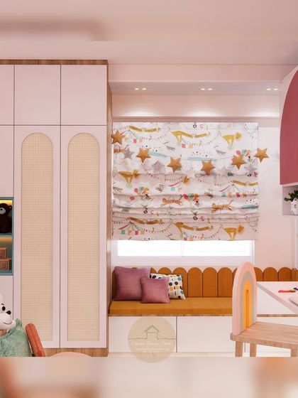 A view of the wardrobe and window seat in the kids' room. The wardrobe has arched cane-paneled doors, and the window seat provides a sunny spot for reading, with extra storage underneath.