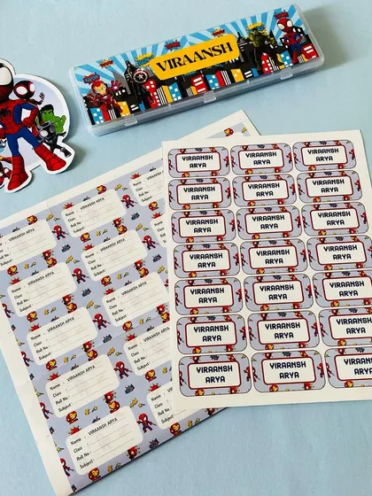 Personalised stationery makes everything more fun. Here we have custom name labels and a pencil box in a cool Avengers theme for 'Viraansh Arya'.