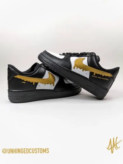 These custom Air Force 1s were commissioned by Budweiser for their employees. The design features a gold drip swoosh and their "Make New Happen" tagline.