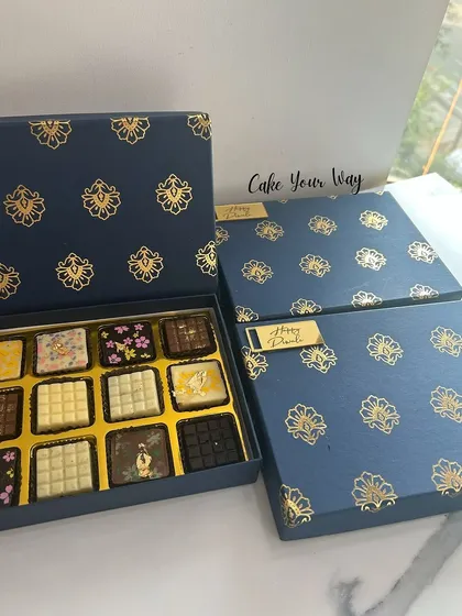This elegant blue and gold box contains my assorted chocolate barks, a popular choice for Diwali. The designs are festive and the flavors are rich and indulgent.