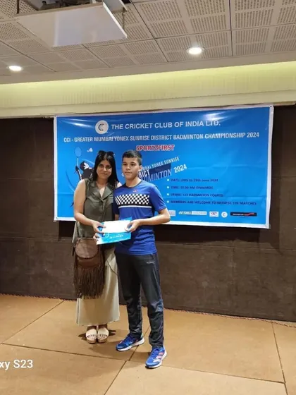 Vikrant Negi receiving his award at the CCI GMBA District Championship, where he won multiple medals across different categories.