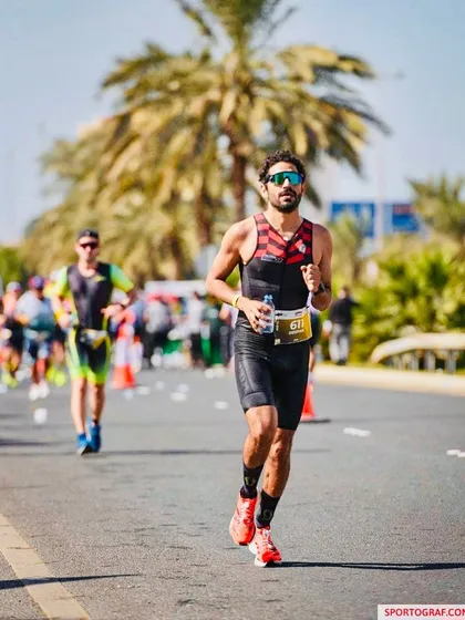 Staying hydrated during the run portion of a hot-weather triathlon. Proper race nutrition and hydration are critical components of our Ironman training program.