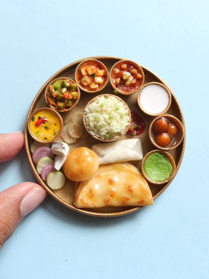 A beautiful North Indian thali magnet, a perfect souvenir or gift.