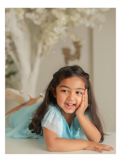 A candid moment of pure happiness. I encourage natural expressions and movements to capture the true personality of your child.