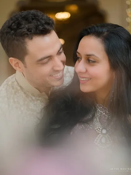A close-up filled with love and adoration. This shot captures the intimate look shared between a couple, making a large palace feel like their own private world.