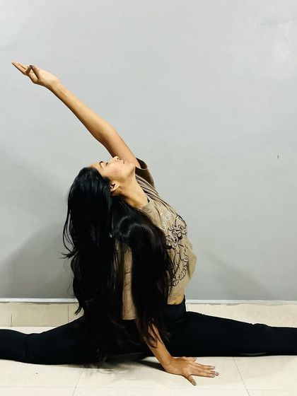 Practice makes progress. Here I am in a side split variation (Samakonasana), a pose that requires deep flexibility in the hips and hamstrings, achieved through consistent practice.