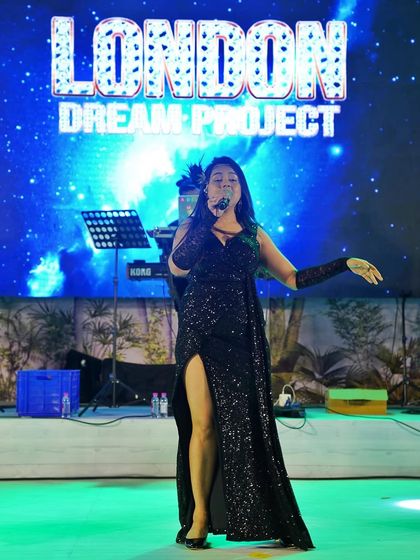 On stage with the London Dream Project. This all-female fronted band brings a unique glamour and energy to wedding parties.