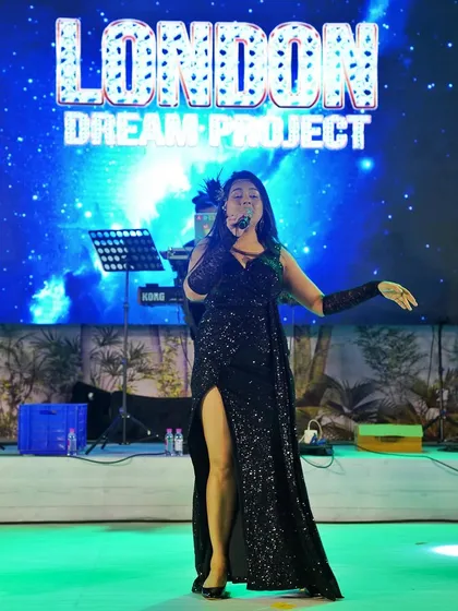 On stage with the London Dream Project. This all-female fronted band brings a unique glamour and energy to wedding parties.
