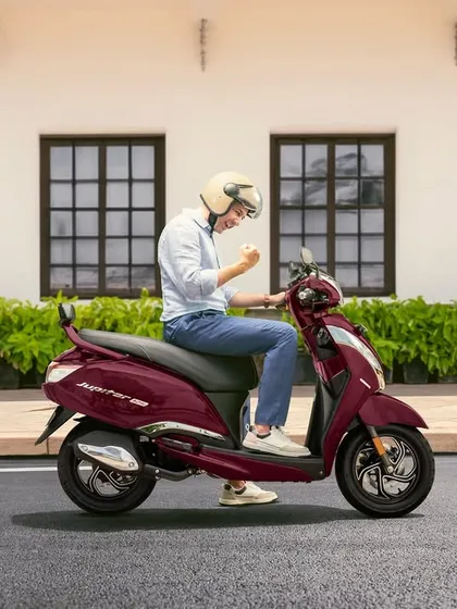 A solo shot for the TVS Jupiter campaign, capturing a moment of excitement. This kind of expressive modeling is crucial for conveying the feeling and benefits of a product.