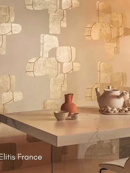 This wallcovering from Élitis France features abstract, floating shapes made of Hanji paper. The design redefines your space, blending art and function to create an atmosphere of elegance and inspiration.