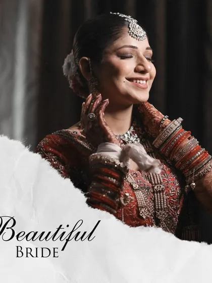 A beautiful portrait of a smiling bride, capturing her joy and the elegance of her wedding attire.