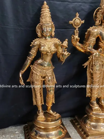 The goddess Sridevi, the consort of Vishnu representing wealth, from a Balaji set. The polished bronze finish highlights her graceful posture and intricate jewelry.