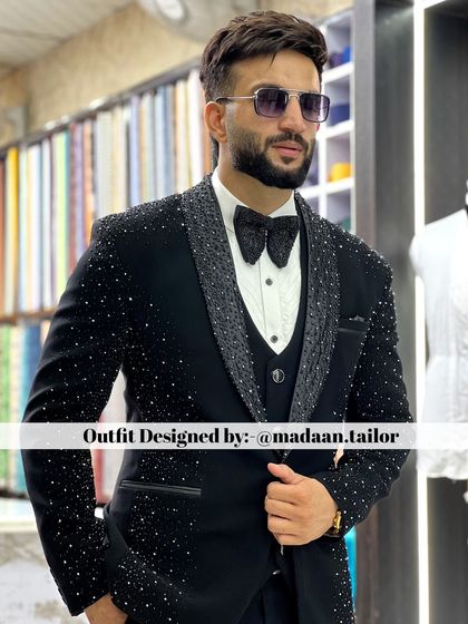 Another angle of the stunning crystal-embellished tuxedo, showcasing its sparkle and the expert tailoring that ensures a perfect fit.