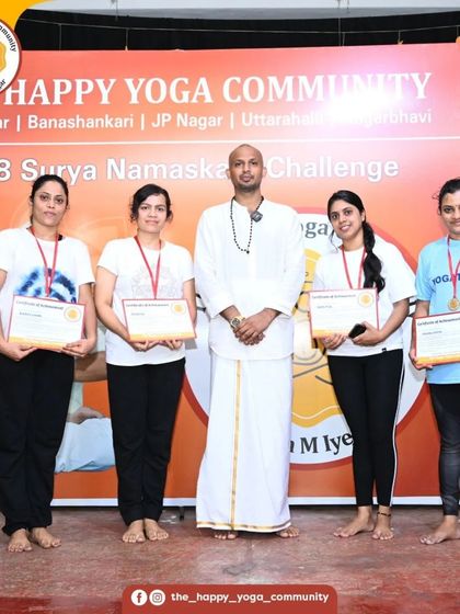 Awarding certificates to participants of the 108 Surya Namaskara challenge. We celebrate the dedication and effort of every single person.