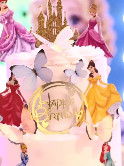 A close-up of a beautiful Disney Princess birthday cake, showing the level of detail that goes into our themed events.