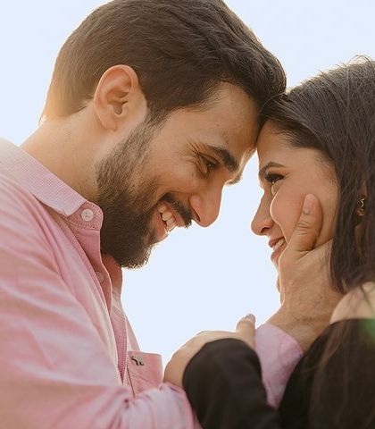 A sun-kissed, joyful portrait where their smiles say everything. We aim to capture the light in your eyes when you look at each other.