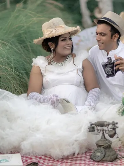 A vintage-themed picnic setup for a unique couple's shoot. I can create customized themes with props to match your personal style.