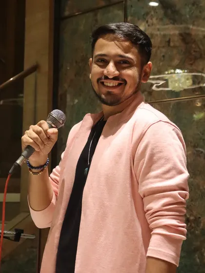 A bright smile for the camera during a live show. Spreading happiness through music is my ultimate goal.