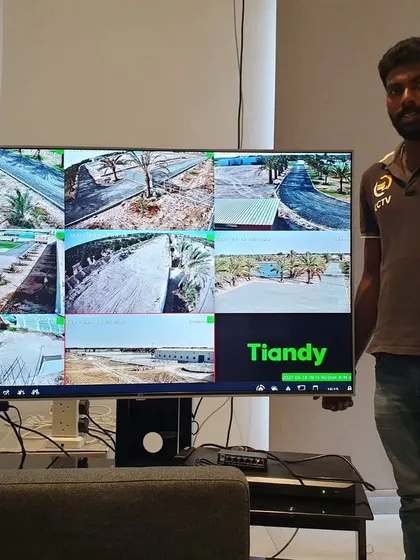 After installation, I make sure you can see everything clearly. This is a multi-camera setup on a large screen, showing the clear, wide coverage from a Tiandy PTZ camera system.